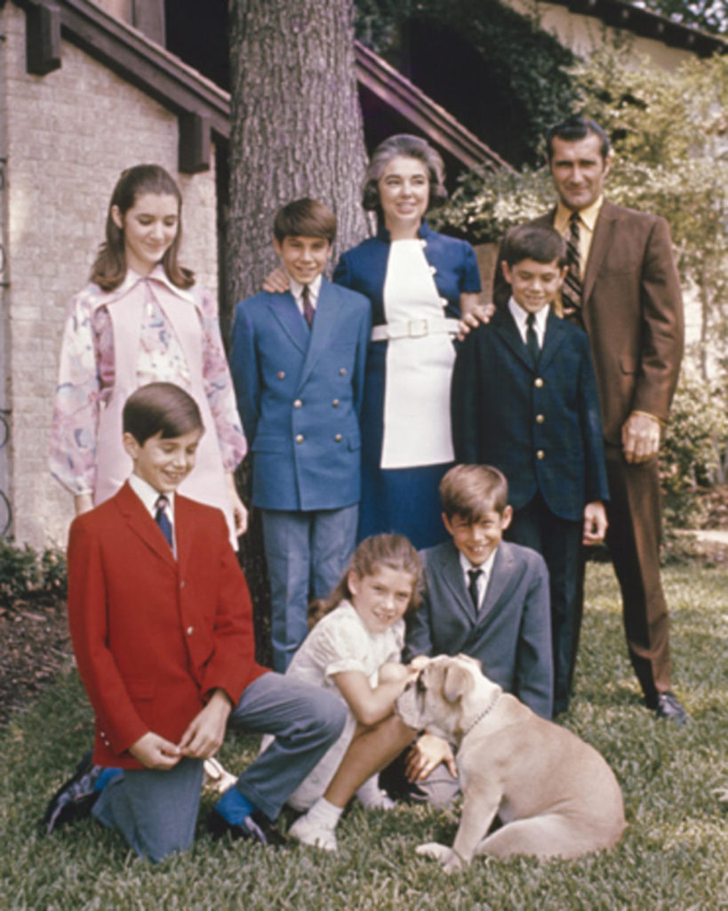 Astronaut Richard Gordon and his family in front yard of house (1969).
